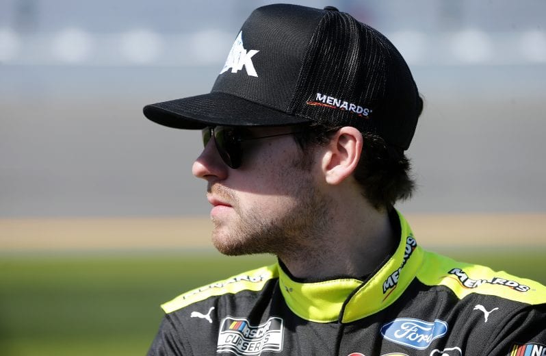 DAYTONA BEACH, FLORIDA - FEBRUARY 09: Ryan Blaney, driver of the #12 Menards/Peak Ford, stands on the grid during qualifying for the NASCAR Cup Series 62nd Annual Daytona 500 at Daytona International Speedway on February 09, 2020 in Daytona Beach, Florida. (Photo by Brian Lawdermilk/Getty Images) | Getty Images
