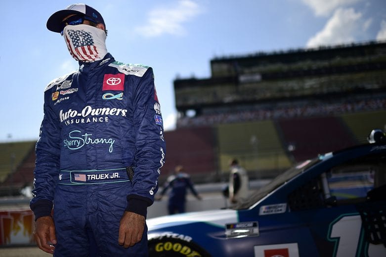 BROOKLYN, MICHIGAN - AUGUST 09: Martin Truex Jr., driver of the #19 Auto-Owner's Insurance Toyota, waits on the grid prior to the NASCAR Cup Series Consumers Energy 400 at Michigan International Speedway on August 09, 2020 in Brooklyn, Michigan. (Photo by Jared C. Tilton/Getty Images) | Getty Images