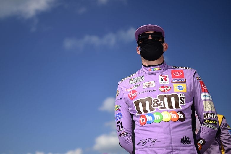 BROOKLYN, MICHIGAN - AUGUST 09: Kyle Busch, driver of the #18 M&M's Fudge Brownie Toyota, waits on the grid prior to the NASCAR Cup Series Consumers Energy 400 at Michigan International Speedway on August 09, 2020 in Brooklyn, Michigan. (Photo by Jared C. Tilton/Getty Images) | Getty Images