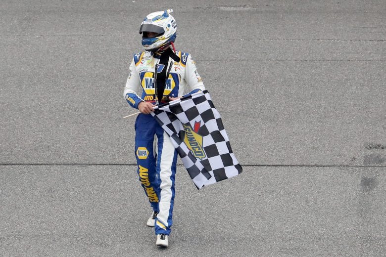 DAYTONA BEACH, FLORIDA - AUGUST 16: Chase Elliott, driver of the #9 NAPA Auto Parts Chevrolet, celebrates with the checkered flag after winning the NASCAR Cup Series Go Bowling 235 at Daytona International Speedway on August 16, 2020 in Daytona Beach, Florida. (Photo by Chris Graythen/Getty Images) | Getty Images