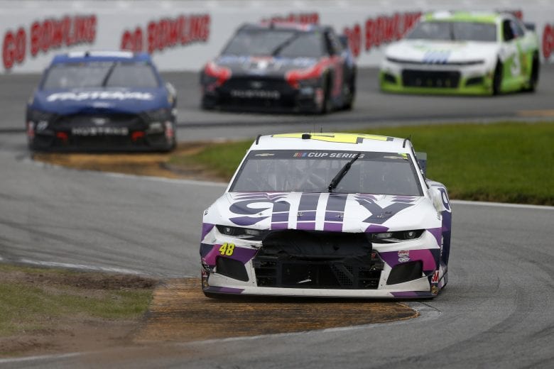 DAYTONA BEACH, FLORIDA - AUGUST 16: Jimmie Johnson, driver of the #48 Ally Chevrolet, leads the field during the NASCAR Cup Series Go Bowling 235 at Daytona International Speedway on August 16, 2020 in Daytona Beach, Florida. (Photo by Brian Lawdermilk/Getty Images) | Getty Images