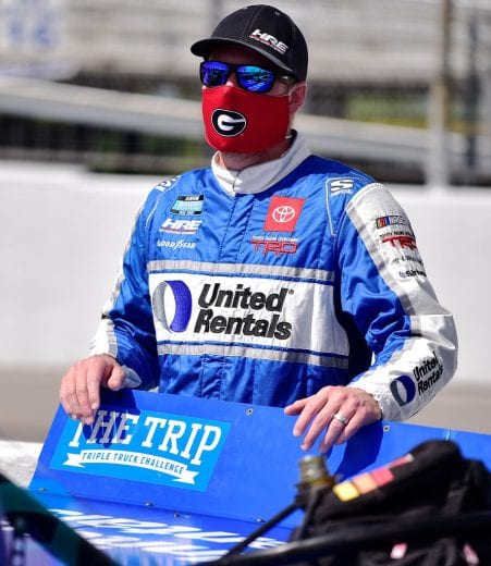 MADISON, IL - AUGUST 30: Austin Hill, driver of the #16 United Rentals Toyota, stands by his truck on pit road prior to the CarShield 200 presented by CK Power for the Gander Outdoors Truck Series at World Wide Technology Raceway on August 30, 2020 in Madison, Illinois. (Photo by Jeff Curry/Getty Images) | Getty Images