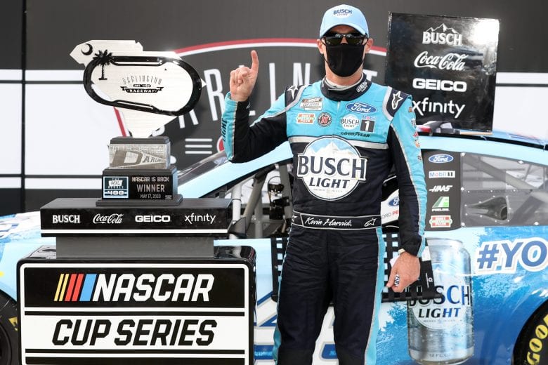 DARLINGTON, SOUTH CAROLINA - MAY 17:  Kevin Harvick, driver of the #4 Busch Light #YOURFACEHERE Ford, celebrates in Victory Lane after winning during the NASCAR Cup Series The Real Heroes 400 at Darlington Raceway on May 17, 2020 in Darlington, South Carolina. (Photo by Chris Graythen/Getty Images) | Getty Images