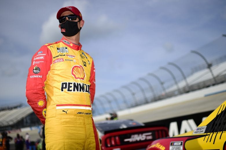 DOVER, DELAWARE - AUGUST 22: Joey Logano, driver of the #22 Shell Pennzoil Ford, waits on the grid prior to during the NASCAR Cup Series Drydene 311 at Dover International Speedway on August 22, 2020 in Dover, Delaware. (Photo by Jared C. Tilton/Getty Images) | Getty Images