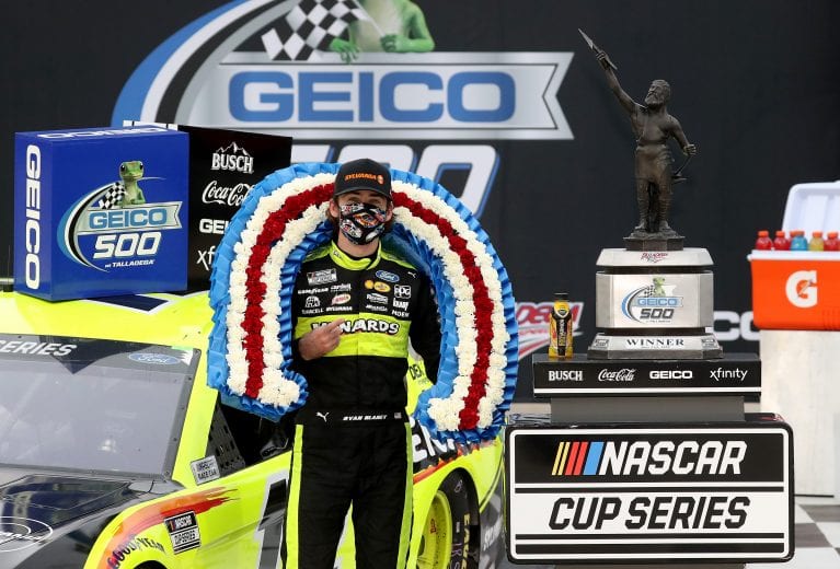 TALLADEGA, ALABAMA - JUNE 22: Ryan Blaney, driver of the #12 Menards/Sylvania Ford, celebrates in Victory Lane after winning the NASCAR Cup Series GEICO 500 at Talladega Superspeedway on June 22, 2020 in Talladega, Alabama. (Photo by Chris Graythen/Getty Images) | Getty Images
