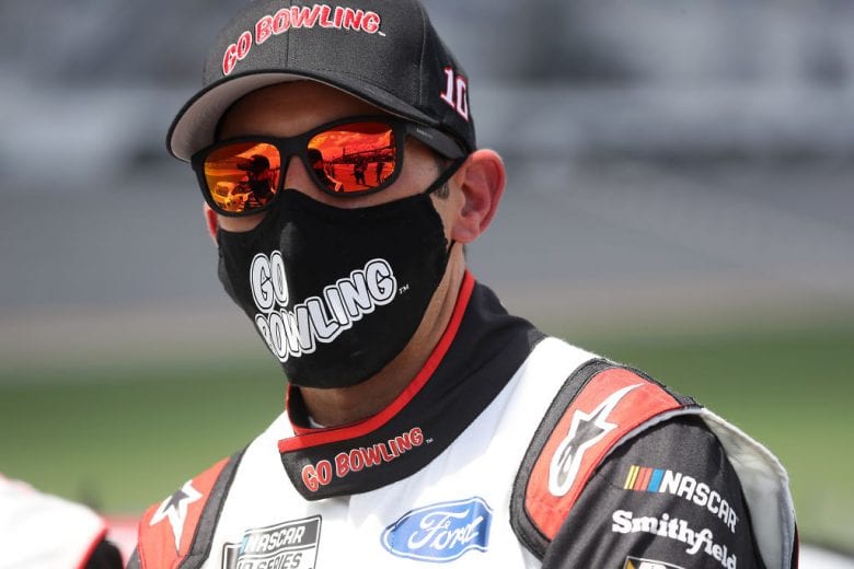 DAYTONA BEACH, FLORIDA - AUGUST 16: Aric Almirola, driver of the #10 Go Bowling Ford, waits on the grid prior to the NASCAR Cup Series Go Bowling 235 at Daytona International Speedway on August 16, 2020 in Daytona Beach, Florida. (Photo by Chris Graythen/Getty Images) | Getty Images