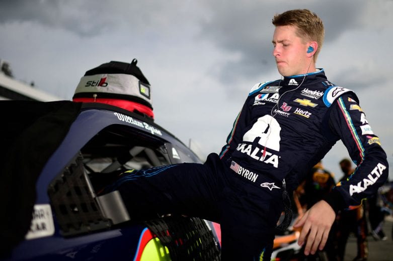 DOVER, DELAWARE - AUGUST 22: William Byron, driver of the #24 Axalta Chevrolet, enters his car to start the NASCAR Cup Series Drydene 311 at Dover International Speedway on August 22, 2020 in Dover, Delaware. (Photo by Jared C. Tilton/Getty Images) | Getty Images
