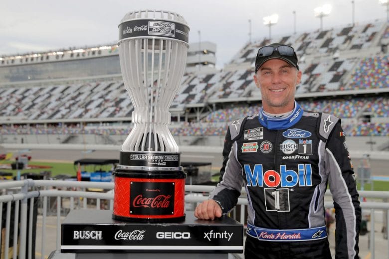 DAYTONA BEACH, FLORIDA - AUGUST 29: Kevin Harvick, driver of the #4 Mobil 1 Ford, poses for a photo after being awarded the 2020 NASCAR Cup Series regular season championship prior during the NASCAR Cup Series Coke Zero Sugar 400 at Daytona International Speedway on August 29, 2020 in Daytona Beach, Florida. (Photo by Chris Graythen/Getty Images) | Getty Images