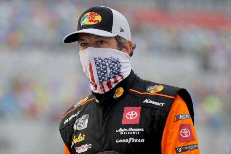 DAYTONA BEACH, FLORIDA - AUGUST 29: Martin Truex Jr., driver of the #19 Bass Pro Shops Toyota, walks on the grid prior to the NASCAR Cup Series Coke Zero Sugar 400 at Daytona International Speedway on August 29, 2020 in Daytona Beach, Florida. (Photo by Chris Graythen/Getty Images) | Getty Images