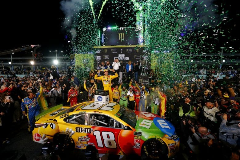 HOMESTEAD, FLORIDA - NOVEMBER 17: Kyle Busch, driver of the #18 M&M's Toyota, celebrates in Victory Lane after winning the Monster Energy NASCAR Cup Series Ford EcoBoost 400 and the Monster Energy NASCAR Cup Series Championship at Homestead Speedway on November 17, 2019 in Homestead, Florida. (Photo by Jonathan Ferrey/Getty Images) | Getty Images