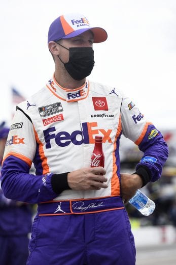 LOUDON, NEW HAMPSHIRE - AUGUST 02: Denny Hamlin, driver of the #11 FedEx Express Toyota, waits on the track prior to the NASCAR Cup Series Foxwoods Resort Casino 301 at New Hampshire Motor Speedway on August 02, 2020 in Loudon, New Hampshire. (Photo by Jared C. Tilton/Getty Images) | Getty Images