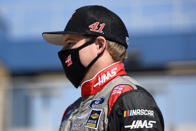 BROOKLYN, MICHIGAN - AUGUST 08: Cole Custer, driver of the #41 HaasTooling.com/Jacob Co. Ford, walks the grid prior to the NASCAR Cup Series FireKeepers Casino 400 at Michigan International Speedway on August 08, 2020 in Brooklyn, Michigan. (Photo by Jared C. Tilton/Getty Images) | Getty Images