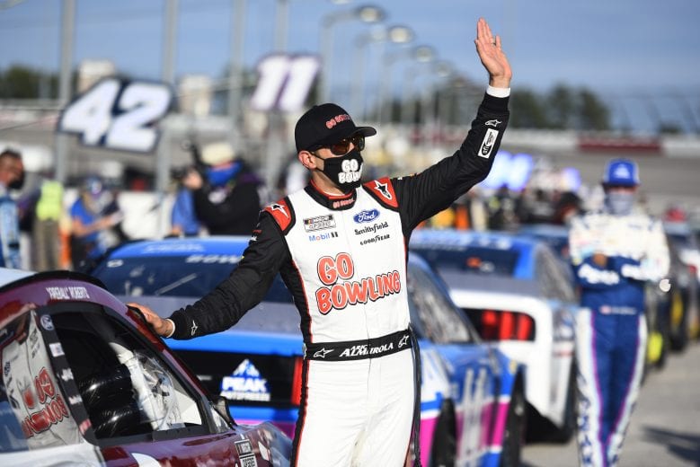 DARLINGTON, SOUTH CAROLINA - SEPTEMBER 06: Aric Almirola, driver of the #10 Go Bowling Ford, waves to fans from the grid prior to the NASCAR Cup Series Cook Out Southern 500 at Darlington Raceway on September 06, 2020 in Darlington, South Carolina. (Photo by Jared C. Tilton/Getty Images) | Getty Images
