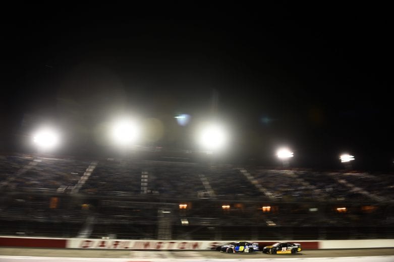 DARLINGTON, SOUTH CAROLINA - SEPTEMBER 06: Chase Elliott, driver of the #9 NAPA Auto Parts Throwback Chevrolet, and Martin Truex Jr., driver of the #19 Bass Pro Shops Toyota, race during the NASCAR Cup Series Cook Out Southern 500 at Darlington Raceway on September 06, 2020 in Darlington, South Carolina. (Photo by Jared C. Tilton/Getty Images) | Getty Images