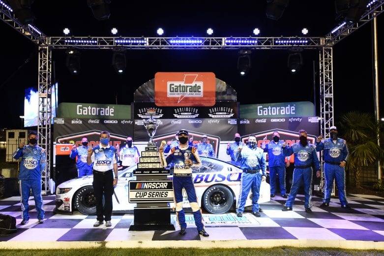 DARLINGTON, SOUTH CAROLINA - SEPTEMBER 06: Kevin Harvick, driver of the #4 Busch Beer Throwback Ford, and crew celebrate in Victory Lane after winning the NASCAR Cup Series Cook Out Southern 500 at Darlington Raceway on September 06, 2020 in Darlington, South Carolina. (Photo by Jared C. Tilton/Getty Images) | Getty Images