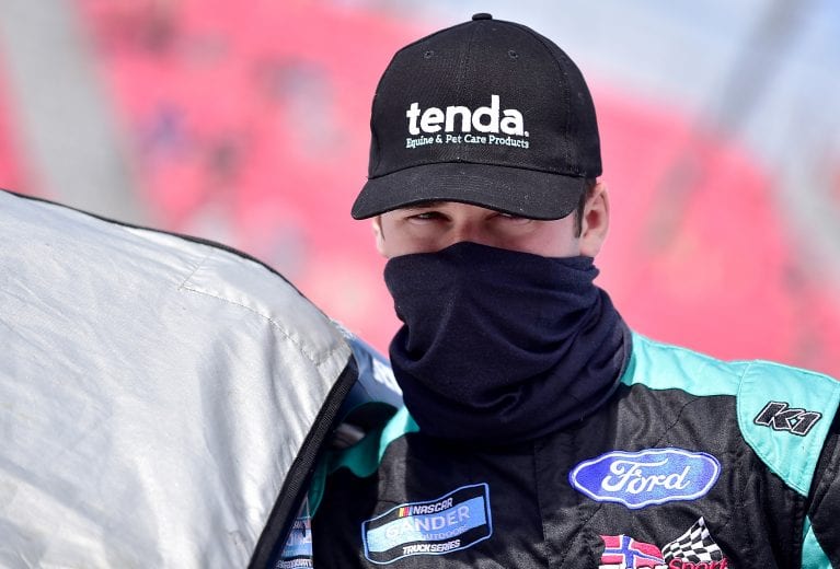 MADISON, ILLINOIS - AUGUST 30: Ben Rhodes, driver of the #99 Tenda Ford, waits on the grid prior to the NASCAR Gander Outdoors Truck Series CarShield 200 Presented by CK Power on August 30, 2020 in Madison, Illinois. (Photo by Jeff Curry/Getty Images) | Getty Images