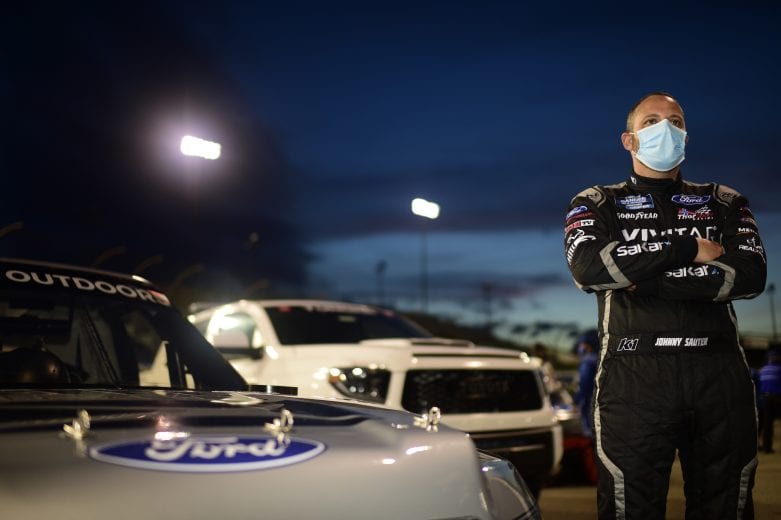 RICHMOND, VIRGINIA - SEPTEMBER 10: Johnny Sauter, driver of the #13 Vivitar Ford, waits on the grid prior to the NASCAR Gander Outdoors Truck Series ToyotaCare 250 at Richmond Raceway on September 10, 2020 in Richmond, Virginia. (Photo by Jared C. Tilton/Getty Images) | Getty Images
