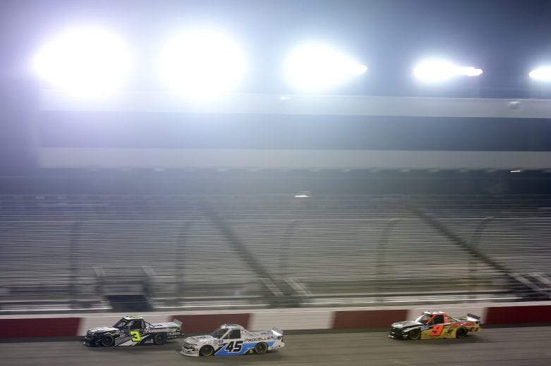 RICHMOND, VIRGINIA - SEPTEMBER 10: Jordan Anderson, driver of the #3 Bommarito.com/Sefton Steel Chevrolet, Trevor Bayne, driver of the #45 Plan B Sales/Proceller8 Chevrolet, and Codie Rohrbaugh, driver of the #9 Pray for Joshua Chevrolet, race during the NASCAR Gander Outdoors Truck Series ToyotaCare 250 at Richmond Raceway on September 10, 2020 in Richmond, Virginia. (Photo by Jared C. Tilton/Getty Images) | Getty Images