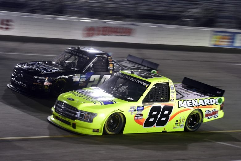 RICHMOND, VIRGINIA - SEPTEMBER 10: Matt Crafton, driver of the #88 Ideal Door/Menards Ford, and Sam Mayer, driver of the #24 AWA Chevrolet, race during the NASCAR Gander Outdoors Truck Series ToyotaCare 250 at Richmond Raceway on September 10, 2020 in Richmond, Virginia. (Photo by Jared C. Tilton/Getty Images) | Getty Images