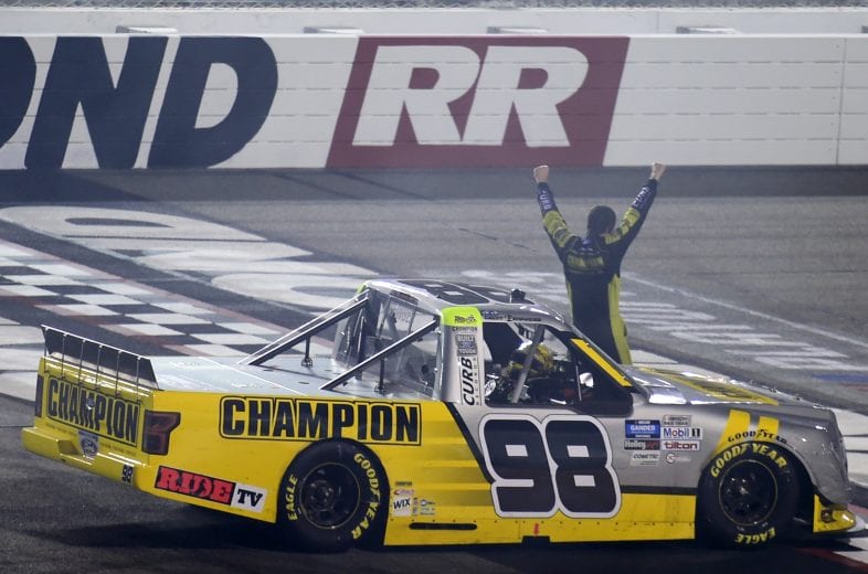RICHMOND, VIRGINIA - SEPTEMBER 10: Grant Enfinger, driver of the #98 Champion/Curb Records Ford, celebrates after winning the NASCAR Gander Outdoors Truck Series ToyotaCare 250 at Richmond Raceway on September 10, 2020 in Richmond, Virginia. (Photo by Jared C. Tilton/Getty Images) | Getty Images