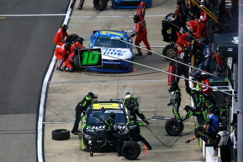 RICHMOND, VIRGINIA - SEPTEMBER 11: Ross Chastain, driver of the #10 Nutrien Ag Solutions Chevrolet, and Justin Allgaier, driver of the #7 BRANDT Chevrolet, pit during the NASCAR Xfinity Series Go Bowling 250 at Richmond Raceway on September 11, 2020 in Richmond, Virginia. (Photo by Sean Gardner/Getty Images) | Getty Images