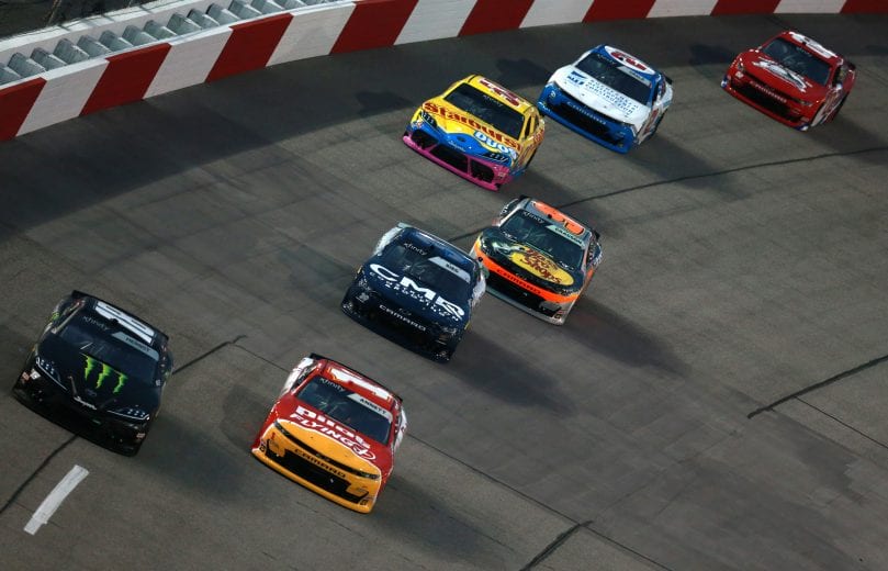 RICHMOND, VIRGINIA - SEPTEMBER 11: Riley Herbst, driver of the #18 Monster Energy Toyota, Michael Annett, driver of the #1 OREO/Pilot Flying J Chevrolet, and Ryan Sieg, driver of the #39 CMRRoofing.com Chevrolet, race during the NASCAR Xfinity Series Go Bowling 250 at Richmond Raceway on September 11, 2020 in Richmond, Virginia. (Photo by Sean Gardner/Getty Images) | Getty Images