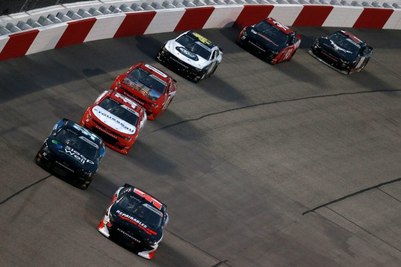 RICHMOND, VIRGINIA - SEPTEMBER 11: Jeremy Clements, driver of the #51 Repairables.com Chevrolet, Josh Williams, driver of the #92 DGM Racing Chevrolet, and Alex Labbe, driver of the #36 DGM Racing Chevrolet, race during the NASCAR Xfinity Series Go Bowling 250 at Richmond Raceway on September 11, 2020 in Richmond, Virginia. (Photo by Sean Gardner/Getty Images) | Getty Images