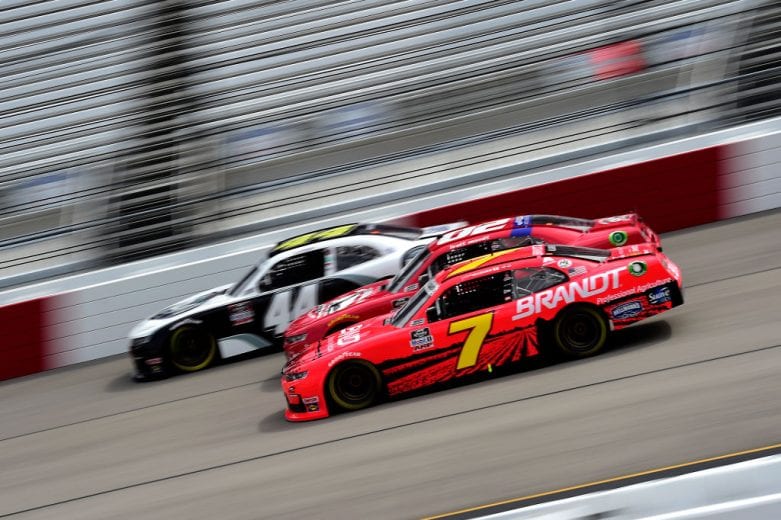 RICHMOND, VIRGINIA - SEPTEMBER 12: Justin Allgaier, driver of the #7 BRANDT Chevrolet, Brett Moffitt, driver of the #02 Robert B Our Inc Co Chevrolet, and Tommy Joe Martins, driver of the #44 AAN Adjusters Chevrolet, race during the NASCAR Xfinity Series Virginia is for Racing Lovers 250 at Richmond Raceway on September 12, 2020 in Richmond, Virginia. (Photo by Jared C. Tilton/Getty Images) | Getty Images