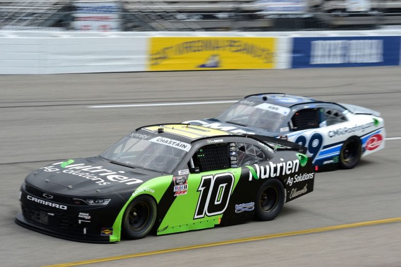 RICHMOND, VIRGINIA - SEPTEMBER 12: Ross Chastain, driver of the #10 Nutrien Ag Solutions Chevrolet, and Ryan Sieg, driver of the #39 CMRRoofing.com Chevrolet, race during the NASCAR Xfinity Series Virginia is for Racing Lovers 250 at Richmond Raceway on September 12, 2020 in Richmond, Virginia. (Photo by Jared C. Tilton/Getty Images) | Getty Images