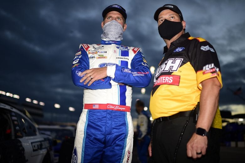 RICHMOND, VIRGINIA - SEPTEMBER 12: Clint Bowyer, driver of the #14 Ford Performance Racing School Ford, and crew chief Greg Zipadelli wait on the grid prior to the NASCAR Cup Series Federated Auto Parts 400 at Richmond Raceway on September 12, 2020 in Richmond, Virginia. (Photo by Jared C. Tilton/Getty Images) | Getty Images