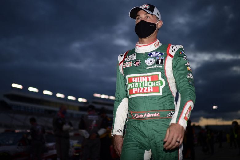 RICHMOND, VIRGINIA - SEPTEMBER 12: Kevin Harvick, driver of the #4 Hunt Brothers Pizza Ford, walks the grid prior to the NASCAR Cup Series Federated Auto Parts 400 at Richmond Raceway on September 12, 2020 in Richmond, Virginia. (Photo by Jared C. Tilton/Getty Images) | Getty Images