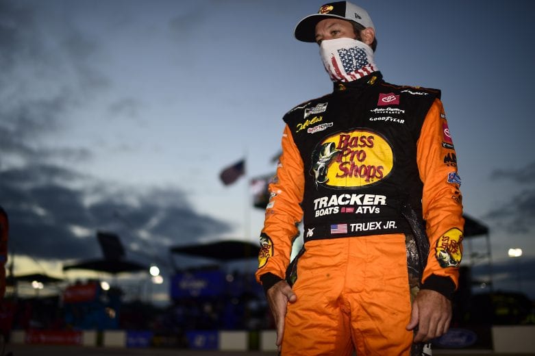RICHMOND, VIRGINIA - SEPTEMBER 12: Martin Truex Jr., driver of the #19 Bass Pro Shops Toyota, waits on the grid prior to the NASCAR Cup Series Federated Auto Parts 400 at Richmond Raceway on September 12, 2020 in Richmond, Virginia. (Photo by Jared C. Tilton/Getty Images) | Getty Images