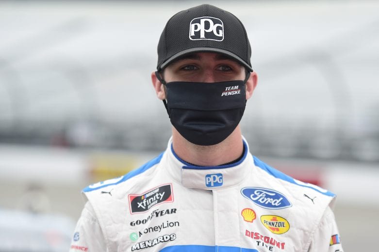 RICHMOND, VIRGINIA - SEPTEMBER 12: Austin Cindric, driver of the #22 PPG Ford, waits on the grid prior to the NASCAR Xfinity Series Virginia is for Racing Lovers 250 at Richmond Raceway on September 12, 2020 in Richmond, Virginia. (Photo by Jared C. Tilton/Getty Images) | Getty Images