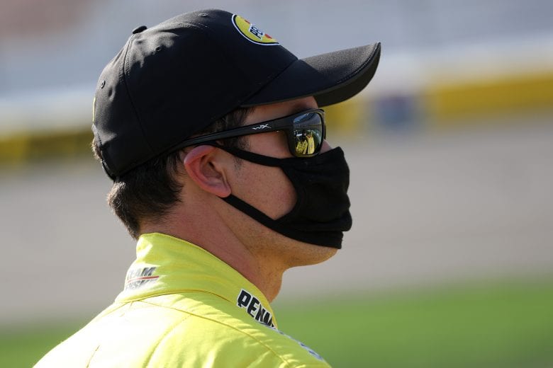 LAS VEGAS, NEVADA - SEPTEMBER 27: Joey Logano, driver of the #22 Pennzoil Ford, stands on the grid prior to the NASCAR Cup Series South Point 400 at Las Vegas Motor Speedway on September 27, 2020 in Las Vegas, Nevada. (Photo by Chris Graythen/Getty Images) | Getty Images
