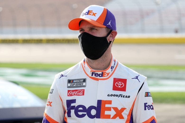 LAS VEGAS, NEVADA - SEPTEMBER 27: Denny Hamlin, driver of the #11 FedEx Office Toyota, stands on the grid prior to the NASCAR Cup Series South Point 400 at Las Vegas Motor Speedway on September 27, 2020 in Las Vegas, Nevada. (Photo by Chris Graythen/Getty Images) | Getty Images