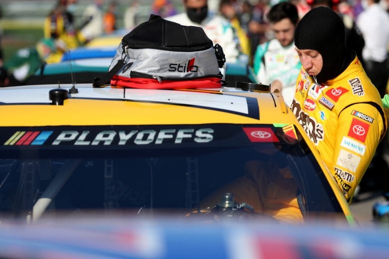 LAS VEGAS, NEVADA - SEPTEMBER 27: Kyle Busch, driver of the #18 M&M's Toyota, climbs into his car prior to the NASCAR Cup Series South Point 400 at Las Vegas Motor Speedway on September 27, 2020 in Las Vegas, Nevada. (Photo by Chris Graythen/Getty Images) | Getty Images
