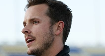 KANSAS CITY, KS - OCTOBER 19:  Trevor Bayne, driver of the #6 AdvoCare Rehydrate Ford, stands on the grid during qualifying for the Monster Energy NASCAR Cup Series Hollywood Casino 400 at Kansas Speedway on October 19, 2018 in Kansas City, Kansas.  (Photo by Chris Graythen/Getty Images) | Getty Images