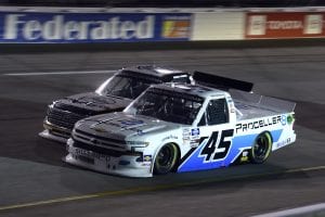 RICHMOND, VIRGINIA - SEPTEMBER 10: Trevor Bayne, driver of the #45 Plan B Sales/Proceller8 Chevrolet, and Derek Kraus, driver of the #19 Gates Hydraulics/NAPA Belts & Hoses Toyota, race during the NASCAR Gander Outdoors Truck Series ToyotaCare 250 at Richmond Raceway on September 10, 2020 in Richmond, Virginia. (Photo by Jared C. Tilton/Getty Images) | Getty Images