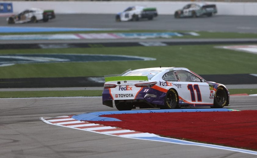 CHARLOTTE, NORTH CAROLINA - SEPTEMBER 29: Denny Hamlin, driver of the #11 FedEx Freight Toyota, races during the Monster Energy NASCAR Cup Series Bank of America ROVAL 400 at Charlotte Motor Speedway on September 29, 2019 in Charlotte, North Carolina. (Photo by Brian Lawdermilk/Getty Images) | Getty Images
