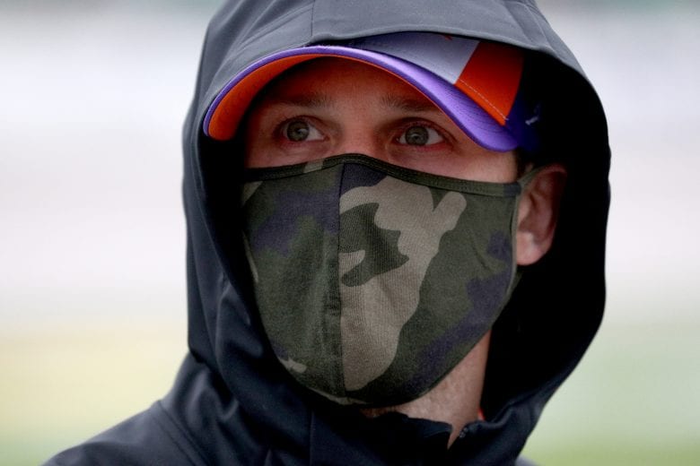 KANSAS CITY, KANSAS - OCTOBER 18: Denny Hamlin, driver of the #11 FedEx Freight Toyota, waits on the grid prior to the NASCAR Cup Series  Hollywood Casino 400 at Kansas Speedway on October 18, 2020 in Kansas City, Kansas. (Photo by Chris Graythen/Getty Images) | Getty Images