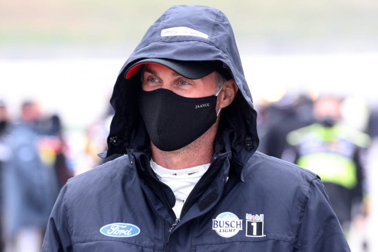 KANSAS CITY, KANSAS - OCTOBER 18: Kevin Harvick, driver of the #4 Jimmy John's Ford, walks the grid prior to the NASCAR Cup Series  Hollywood Casino 400 at Kansas Speedway on October 18, 2020 in Kansas City, Kansas. (Photo by Chris Graythen/Getty Images) | Getty Images