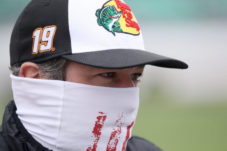 KANSAS CITY, KANSAS - OCTOBER 18: Martin Truex Jr., driver of the #19 Bass Pro Shops Toyota, waits on the grid prior to during the NASCAR Cup Series  Hollywood Casino 400 at Kansas Speedway on October 18, 2020 in Kansas City, Kansas. (Photo by Chris Graythen/Getty Images) | Getty Images