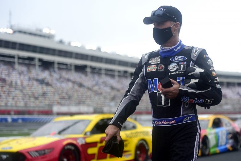 CONCORD, NORTH CAROLINA - OCTOBER 11: Kevin Harvick, driver of the #4 Mobil 1 Ford, walks the grid prior to the NASCAR Cup Series Bank of America ROVAL 400 at Charlotte Motor Speedway on October 11, 2020 in Concord, North Carolina. (Photo by Jared C. Tilton/Getty Images) | Getty Images