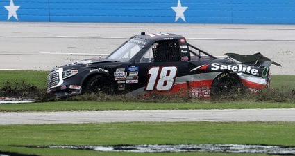 FORT WORTH, TEXAS - OCTOBER 25: Christian Eckes, driver of the #18 Safelite AutoGlass Toyota, spins into the infield grass after an on-track incident during the NASCAR Gander RV & Outdoors Truck Series SpeedyCash.com 400 at Texas Motor on October 25, 2020 in Fort Worth, Texas. (Photo by Chris Graythen/Getty Images) | Getty Images