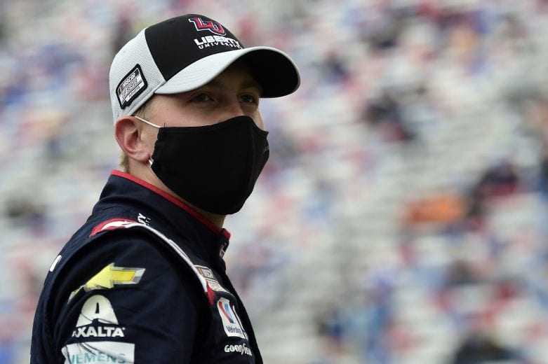 BRISTOL, TENNESSEE - SEPTEMBER 19: William Byron, driver of the #24 Liberty University Chevrolet, stands on the grid prior to the NASCAR Cup Series Bass Pro Shops Night Race at Bristol Motor Speedway on September 19, 2020 in Bristol, Tennessee. (Photo by Jared C. Tilton/Getty Images) | Getty Images