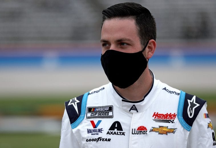 FORT WORTH, TEXAS - OCTOBER 25: Alex Bowman, driver of the #88 Acronis Chevrolet, waits on the grid prior to the NASCAR Cup Series Autotrader EchoPark Automotive 500 at Texas Motor Speedway on October 25, 2020 in Fort Worth, Texas. (Photo by Chris Graythen/Getty Images) | Getty Images
