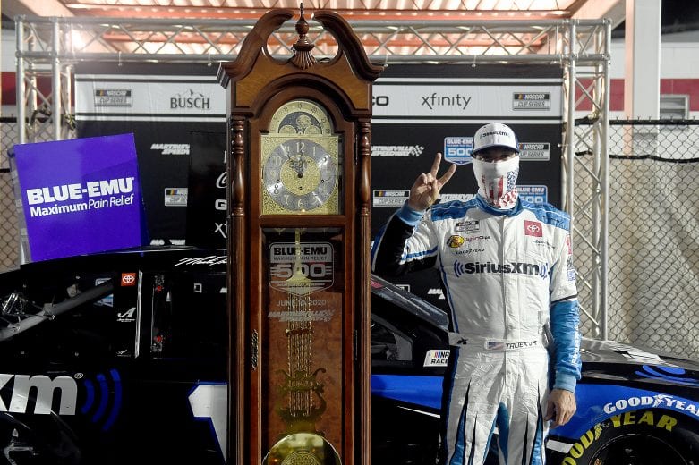 MARTINSVILLE, VIRGINIA - JUNE 10: Martin Truex Jr., driver of the #19 SiriusXM Toyota, celebrates in Victory Lane after winning the NASCAR Cup Series Blue-Emu Maximum Pain Relief 500 at Martinsville Speedway on June 10, 2020 in Martinsville, Virginia. (Photo by Jared C. Tilton/Getty Images) | Getty Images