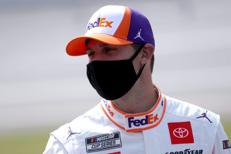 TALLADEGA, ALABAMA - OCTOBER 04: Denny Hamlin, driver of the #11 FedEx Express Toyota, waits on the grid prior to the NASCAR Cup Series YellaWood 500 at Talladega Superspeedway on October 04, 2020 in Talladega, Alabama. (Photo by Chris Graythen/Getty Images) | Getty Images