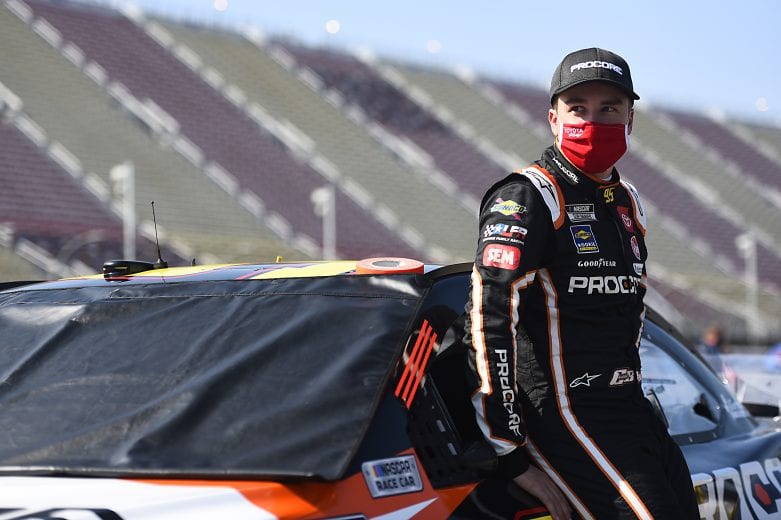 BROOKLYN, MICHIGAN - AUGUST 08: Christopher Bell, driver of the #95 Procore Toyota, waits on the grid prior to the NASCAR Cup Series FireKeepers Casino 400 at Michigan International Speedway on August 08, 2020 in Brooklyn, Michigan. (Photo by Jared C. Tilton/Getty Images) | Getty Images