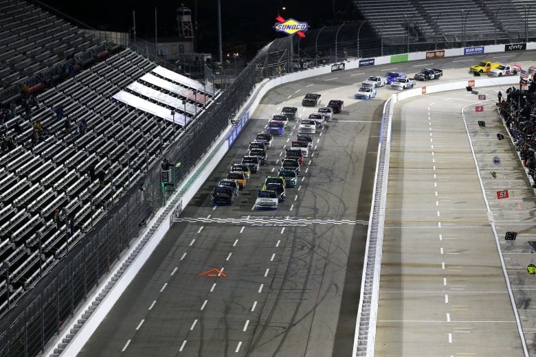 MARTINSVILLE, VIRGINIA - OCTOBER 30: Sheldon Creed, driver of the #2 Chevy Truck Month Chevrolet, and Zane Smith, driver of the #21 LaPaz/MRC Chevrolet, lead the field to start the NASCAR Gander RV & Outdoors Truck Series NASCAR Hall of Fame 200 at Martinsville Speedway on October 30, 2020 in Martinsville, Virginia. (Photo by Brian Lawdermilk/Getty Images) | Getty Images